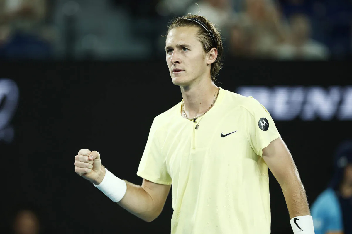 Sebastian Korda of the United States celebrates after winning a point during the third round singles match against Daniil Medvedev during day five of the 2023 Australian Open at Melbourne Park in Melbourne, Australia, on Jan. 20, 2023. (Daniel Pockett/Getty Images)