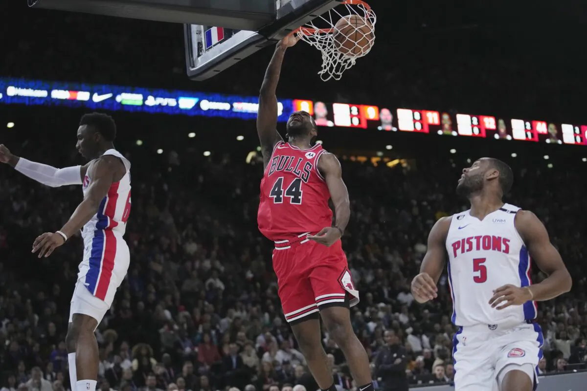 Chicago Bulls Partrick Williams (C) dunks during the NBA basketball game between Chicago Bulls and Detroit Pistons at the Accor Arena in Paris on Jan. 19, 2023. (Christophe Ena/AP Photo)