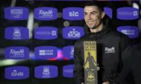 Bruised Ronaldo Scores Twice to Edge Showdown With Messi