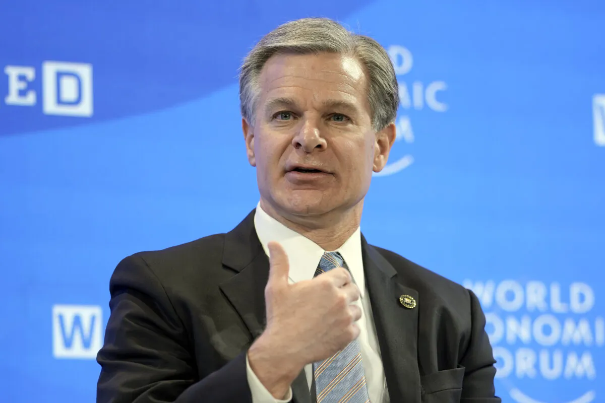 FBI Director Christopher Wray speaks at the World Economic Forum in Davos, Switzerland, on Jan. 19, 2023. (Markus Schreiber/AP Photo)