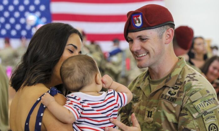 A Soldier reunites with family at Fort Bragg, N.C., on July 12, 2022, after returning home from deployment. (U.S. Army photo by Spc. Lilliana Fraser)

