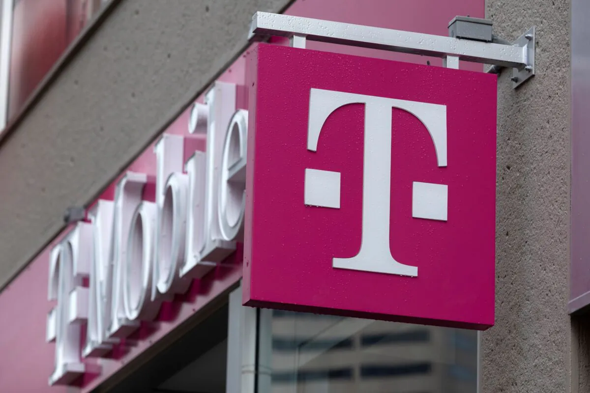 The T-Mobile logo is seen on a storefront, in Boston, Mass., on Oct. 14, 2022. (Michael Dwyer/AP Photo)