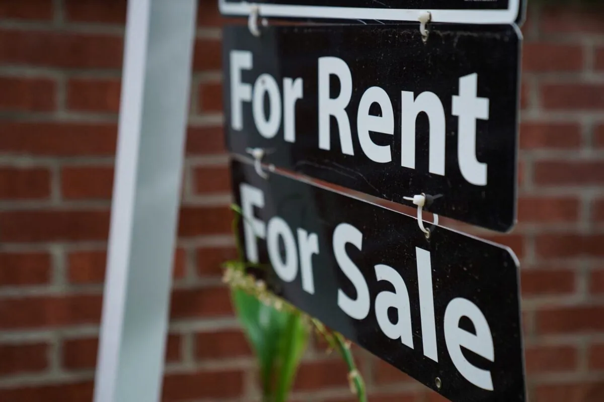 A "For Rent, For Sale" sign is seen outside of a home in Washington on July 7, 2022. (Sarah Silbiger/Reuters)