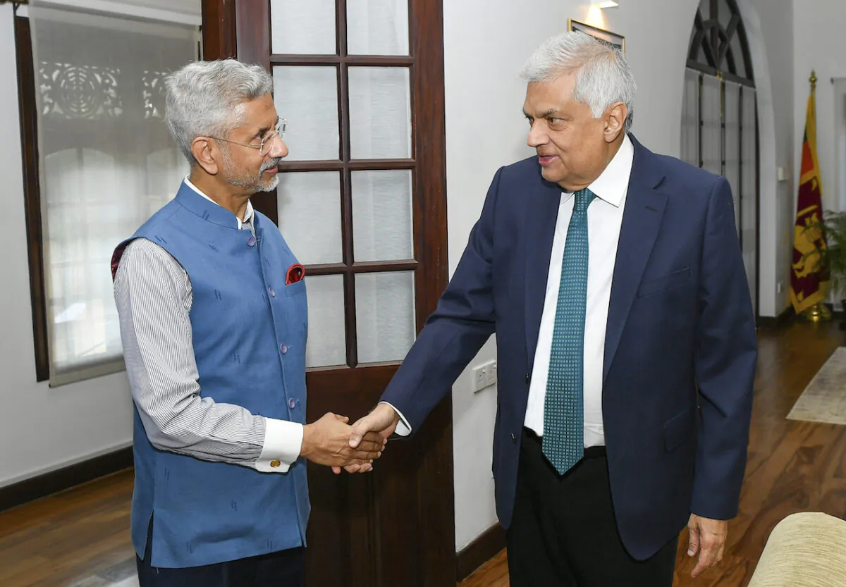 Sri Lankan President Ranil Wickremesinghe (R), shakes hands with 
India’s Foreign Minister S. Jaishankar (L), in Colombo, Sri Lanka, on Jan. 20, 2023. (Sri Lankan President's Office via AP)