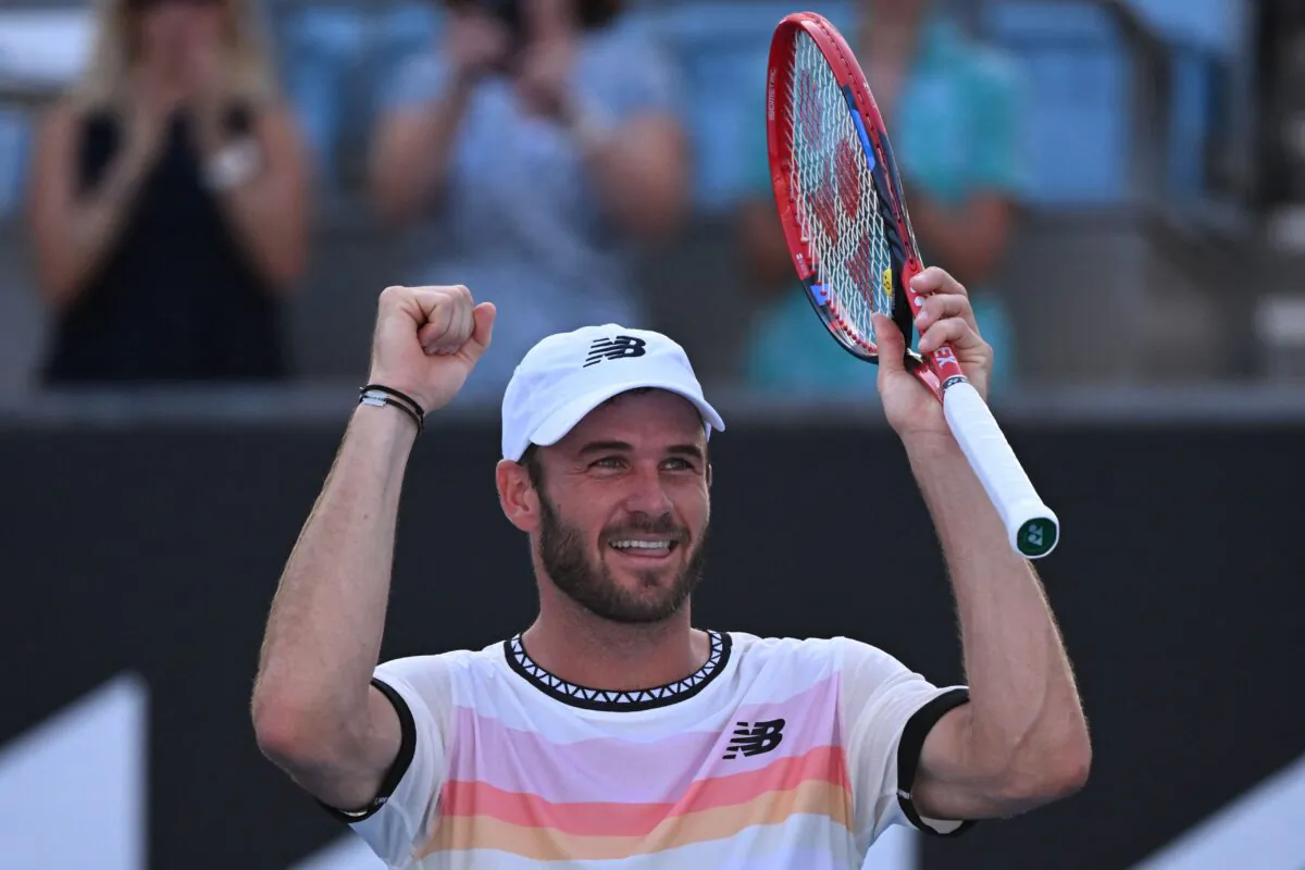 USA's Tommy Paul celebrates after winning USA's Jenson Brooksby during their men's singles match on day six of the Australian Open tennis tournament in Melbourne, Australia, on Jan. 21, 2023.(William West/AFP via Getty Images)