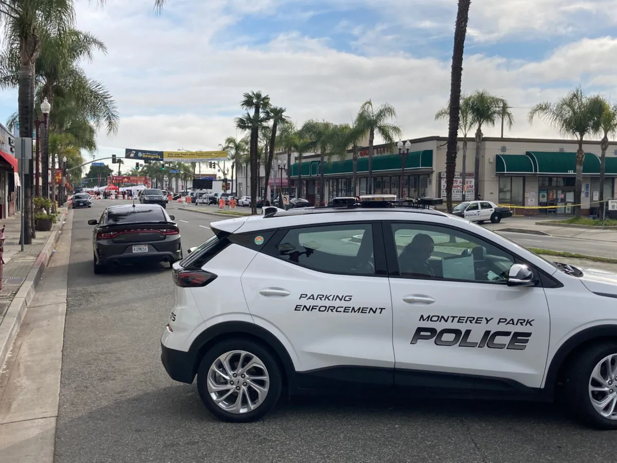 Monterey Park Police Department vehicles are seen nearby the scene of a mass shooting in Monterey Park, Calif., on Jan. 22, 2023. (Annie Wang/NTD Television)