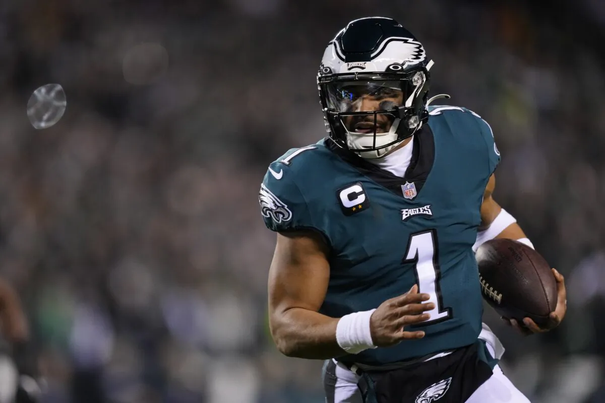 Philadelphia Eagles quarterback Jalen Hurts runs for a touchdown against the New York Giants during the first half of an NFL divisional round playoff football game in Philadelphia on Jan. 21, 2023. (Matt Rourke/AP Photo)