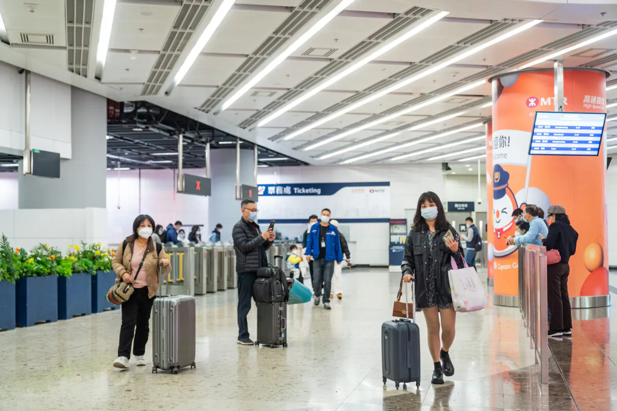 Passengers arriving Hong Kong by high-speed rail from Mainland China on Jan. 20, 2023. (Benson Lau/The Epoch Times)