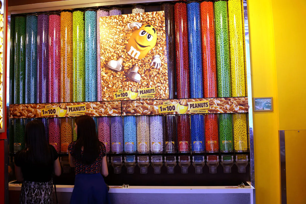 People visit M&M'S World in Times Square, in New York City, on July 24, 2014. (Photo by Spencer Platt/Getty Images)
