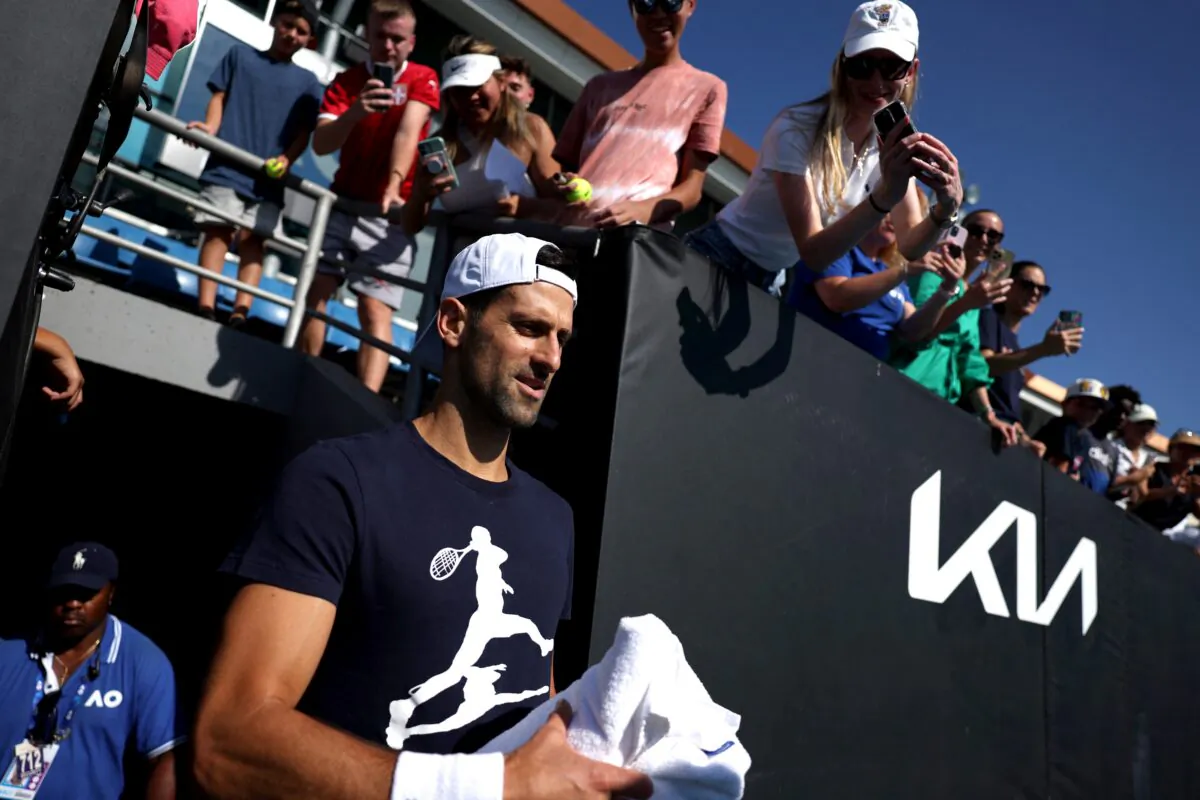 Serbia's Novak Djokovic arrives on court before practice at the Australian Open at Melbourne Park in Melbourne, Australia, on Jan. 23, 2023. (Loren Elliott/Reuters)