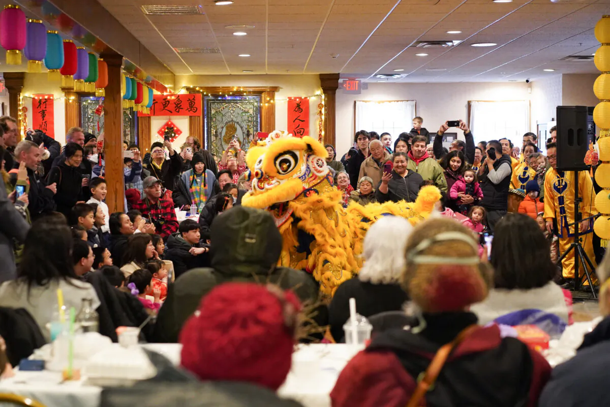 Lion dance performance during the Chinese New Year celebration at the Erie Trackside Manor in Port Jervis, N.Y., on Jan. 22, 2023. (Cara Ding/The Epoch Times)