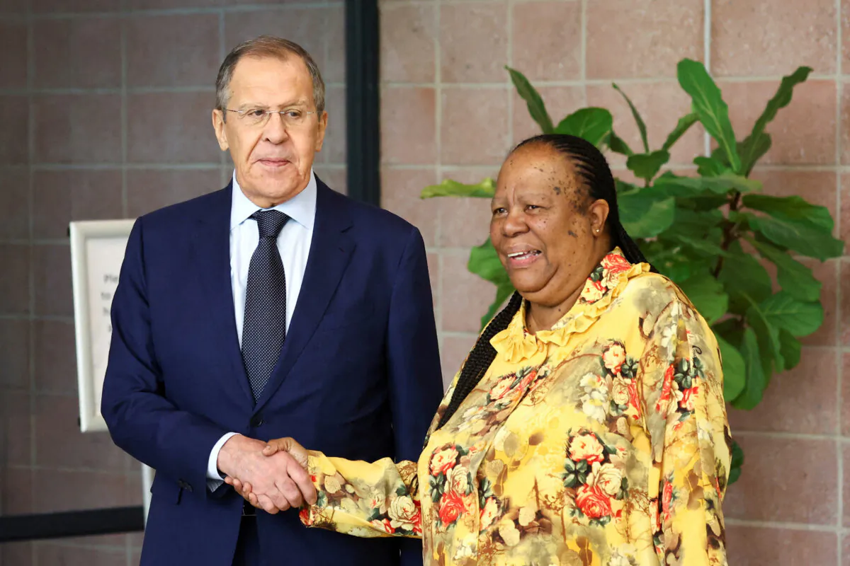 South Africa's Foreign Minister Naledi Pandor shakes hands with Russia's Foreign Minister Sergei Lavrov, ahead of their bilateral meeting in Pretoria, South Africa, Jan. 23, 2023. (Siphiwe Sibeko/Reuters)