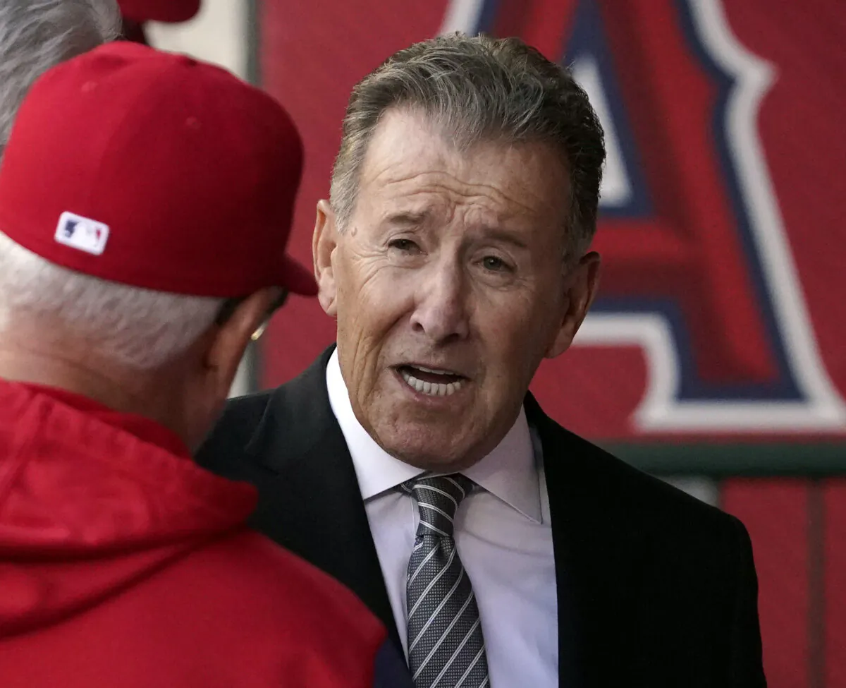 Los Angeles Angels owner Arte Moreno, right, talks with Angels manager Joe Maddon prior to a baseball game against the Cleveland Guardians, in Anaheim, Calif. on April 26, 2022. (Mark J. Terrill/AP Photo)