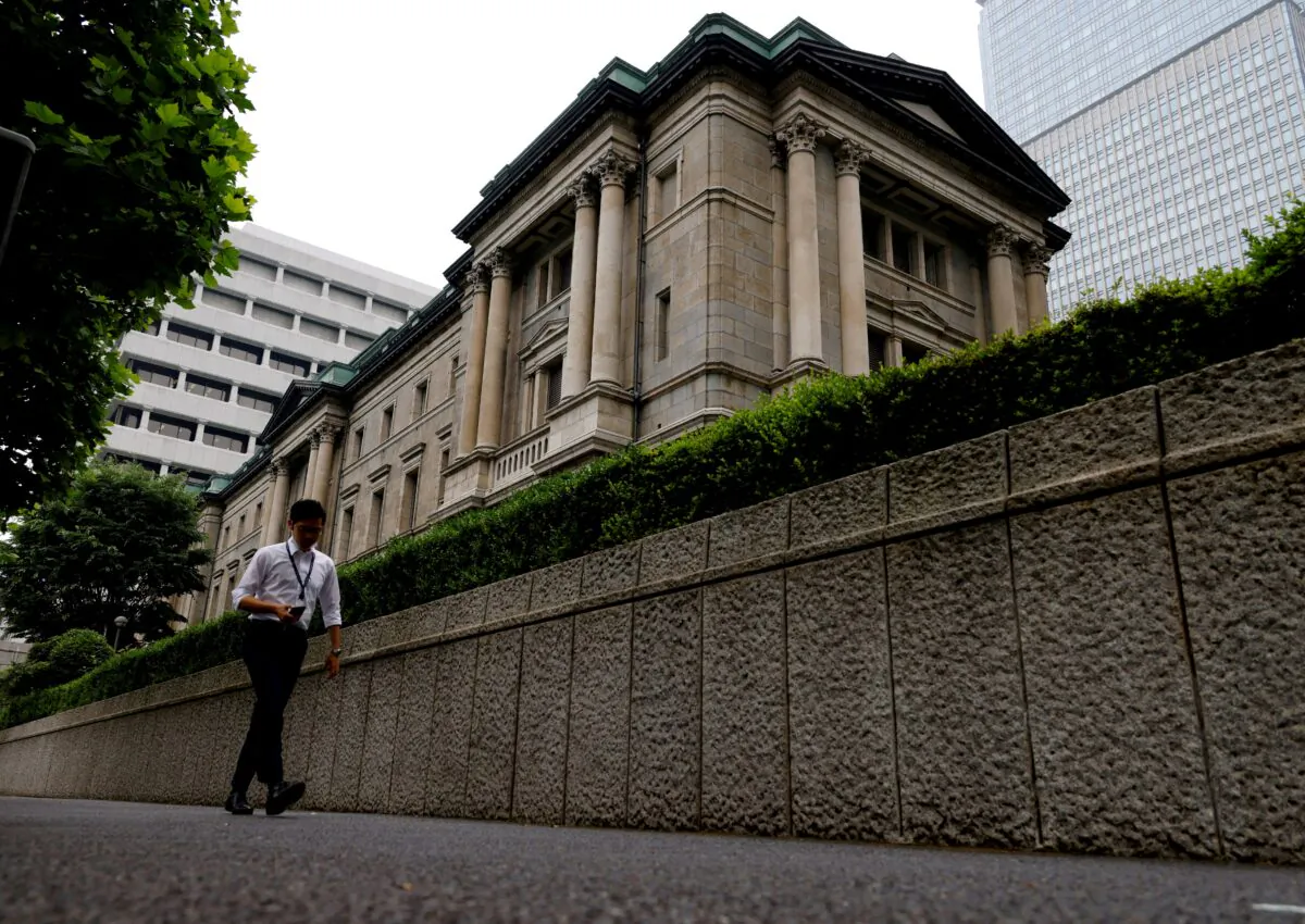 A man walks past Bank of Japan's headquarters in Tokyo on June 17, 2022. (Kim Kyung-Hoon/Reuters)