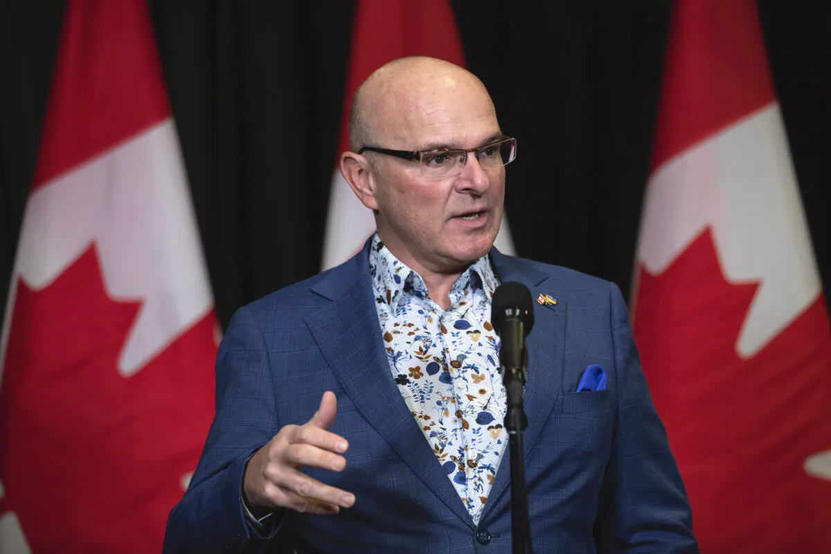 Minister of Tourism and Associate Minister of Finance Randy Boissonnault speaks to the media at the Hamilton Convention Centre in Hamilton during the second day of meetings at Liberal Cabinet retreat, on Jan. 24, 2023. (The Canadian Press/Nick Iwanyshyn0