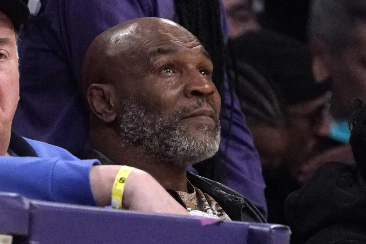 Mike Tyson watches the first half of an NBA basketball game between the Los Angeles Lakers and the New Orleans Pelicans in Los Angeles on Feb. 27, 2022. (Mark J. Terrill/AP Photo)