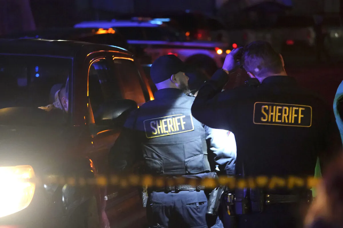 Law enforcement personnel control the scene of a shooting in Half Moon Bay, Calif., on Jan. 23, 2023. (Jeff Chiu/AP Photo)