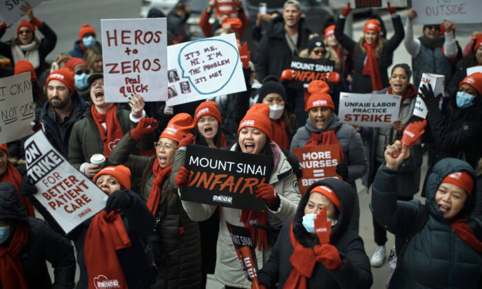 Nurses shout slogans during a nursing strike outside Mount Sinai Hospital in New York on Jan. 10, 2023. (Andres Kudacki/AP Photo)