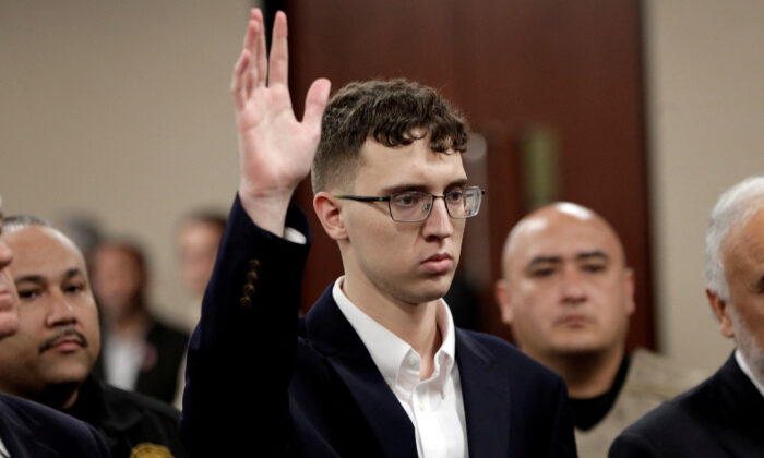 El Paso Walmart mass shooter Patrick Crusius, a 21-year-old male from Allen, Texas, accused of killing 22 and injuring 25, is arraigned in El Paso, Texas on Oct. 10, 2019. (Mark Lambie/Pool via Reuters)