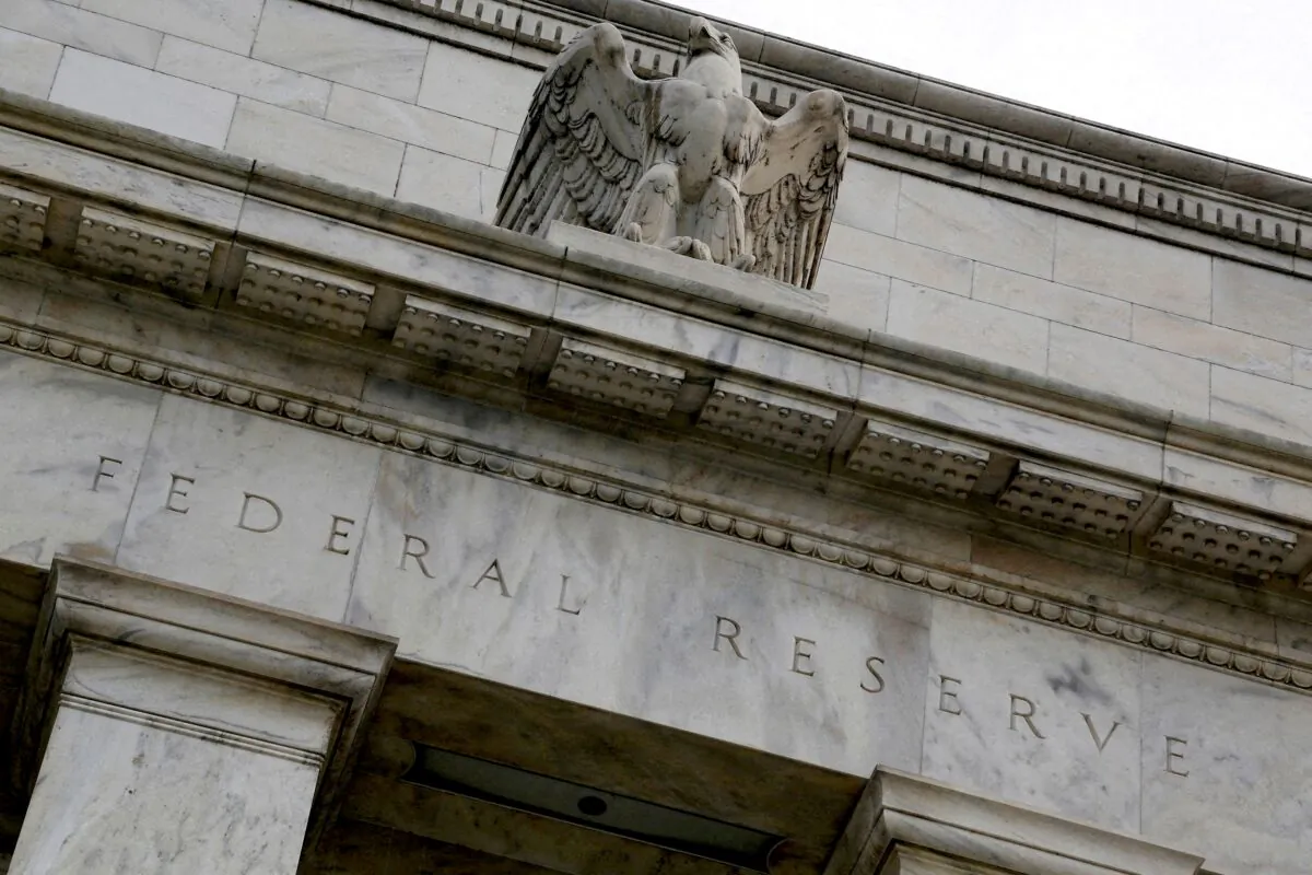 An eagle tops the U.S. Federal Reserve building's facade in Washington on July 31, 2013. (Jonathan Ernst/Reuters)