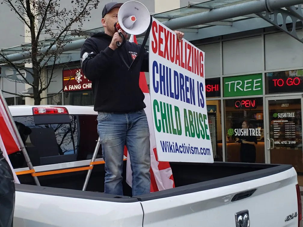 A file photo of a protester demonstrating against a drag queen performance for children in Vancouver on Jan. 14, 2023. (Jeff Sandes/The Epoch Times)