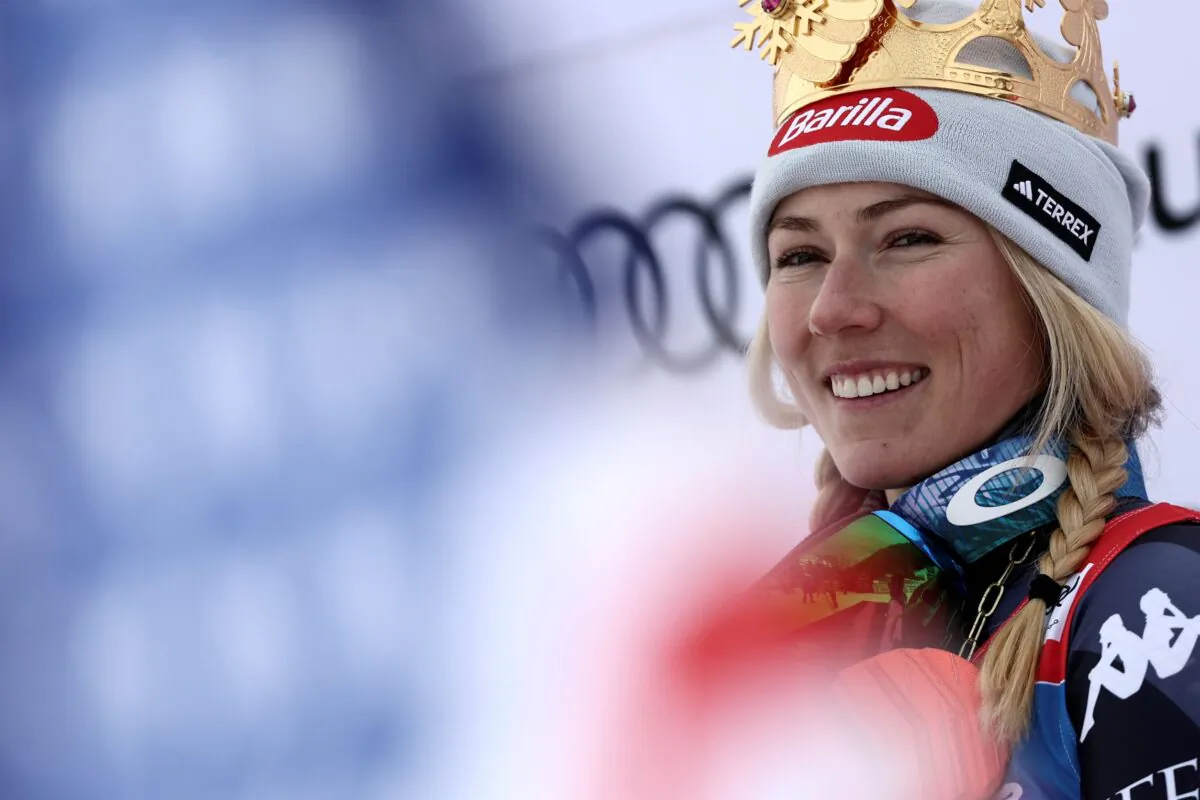United States' Mikaela Shiffrin smiles on the podium after winning an alpine ski, women's World Cup giant slalom, in Kronplatz, Italy, on Jan. 24, 2023. (Gabriele Facciotti/AP Photo)