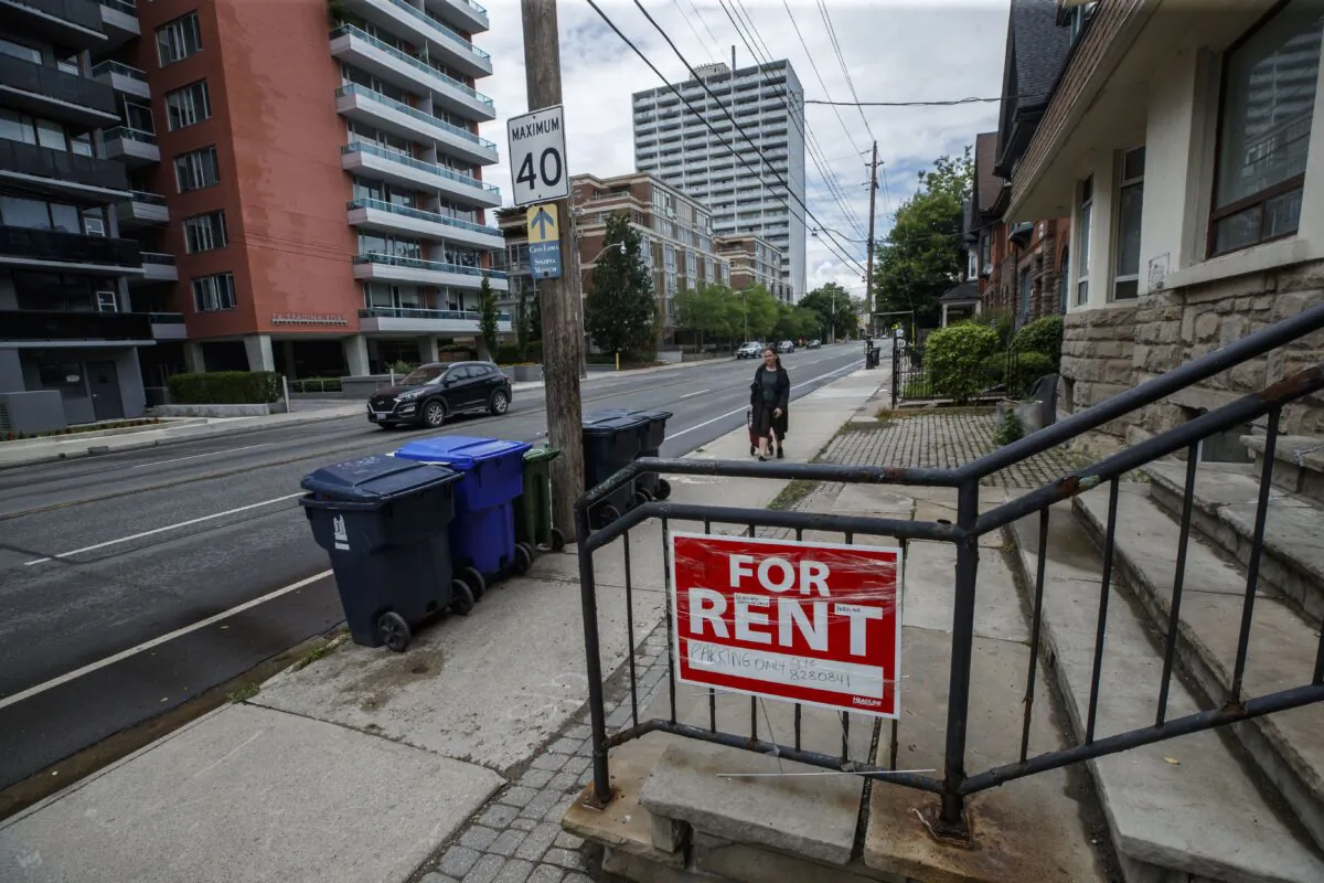 A “for rent” sign outside a home in Toronto on July 12, 2022. (The Canadian Press/Cole Burston)