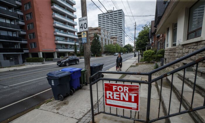 A “for rent” sign outside a home in Toronto on July 12, 2022. (The Canadian Press/Cole Burston)