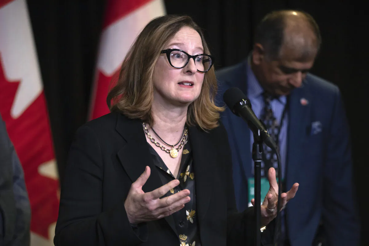 Carolyn Wilkins, Senior Research Scholar with the Griswold Center for Economic Policy Studies at Princeton University, speaks to the media at the Hamilton Convention Centre, in Hamilton, Ont., during the second day of meetings at the Liberal Cabinet retreat, on Jan. 24, 2023. (The Canadian Press/Nick Iwanyshyn)