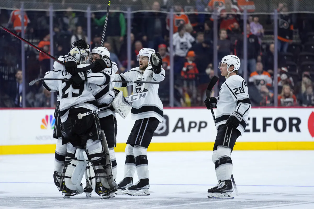 Los Angeles Kings' players celebrate after winning an NHL hockey game against the Philadelphia Flyers in Philadelphia on Jan. 24, 2023. (Matt Slocum/AP Photo)