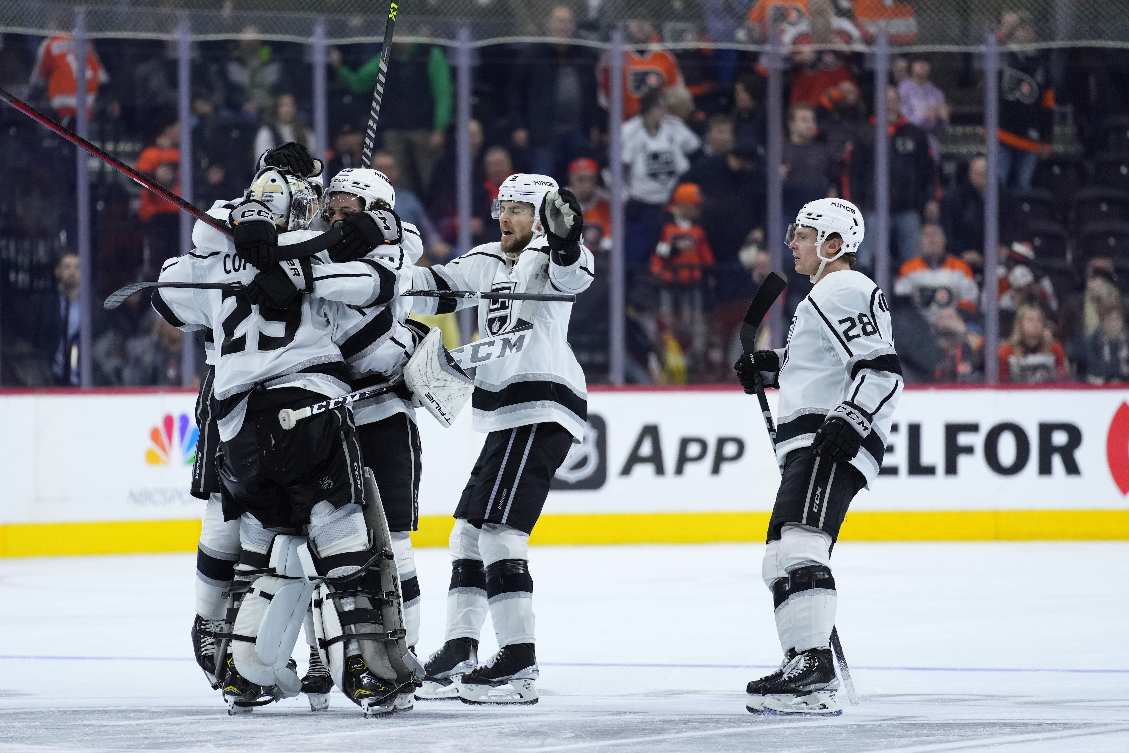 Los Angeles Kings defenseman Sean Durzi celebrates a goal with Los