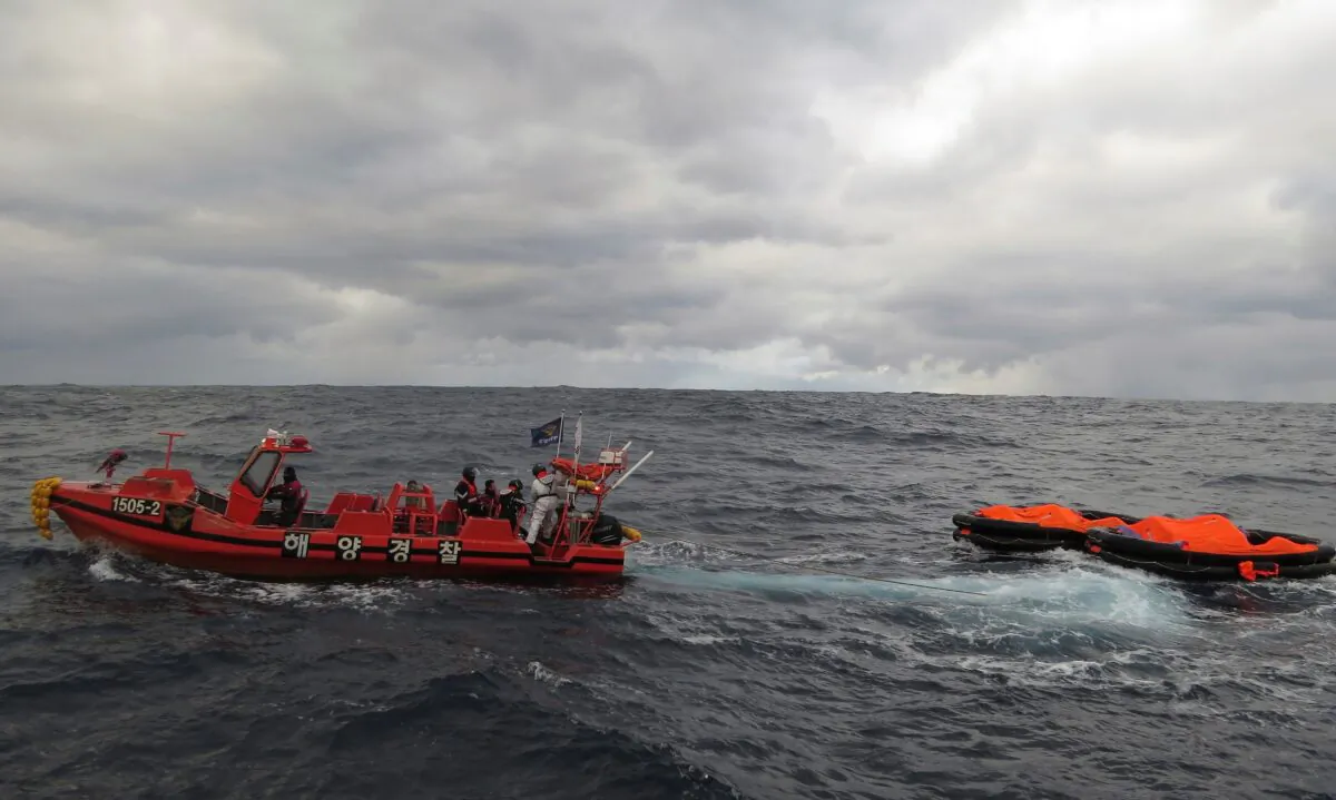 A South Korea coast guard vessel conducts a search operation in waters between South Korea and Japan, on Jan. 25, 2023. (The Korea Coast Guard via AP)
