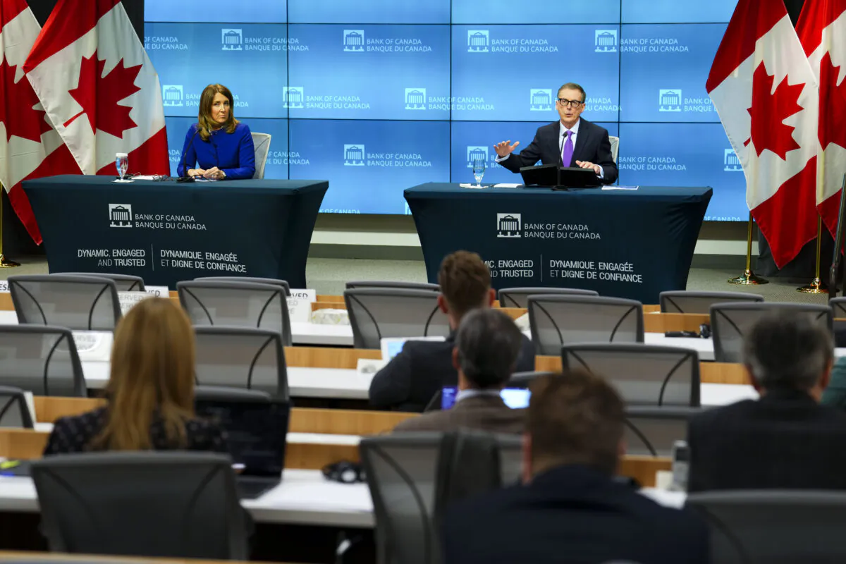 Tiff Macklem, Governor of the Bank of Canada, and Carolyn Rogers, Senior Deputy Governor, hold a press conference at the Bank of Canada in Ottawa on Jan. 25, 2023. (The Canadian Press/Sean Kilpatrick)