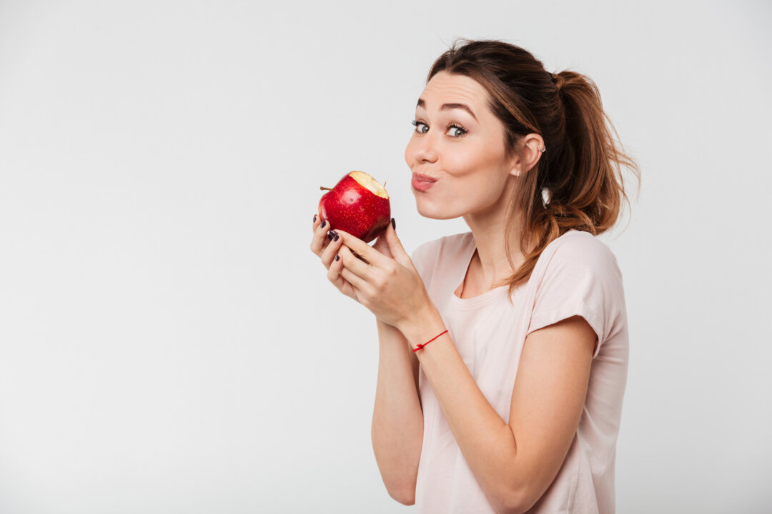 Simply incorporating a good apple—that is to say, 100 percent organic, nonirradiated, etc.—into your daily diet should constitute an extremely pleasurable experience. (Dean Drobot/Shutterstock)