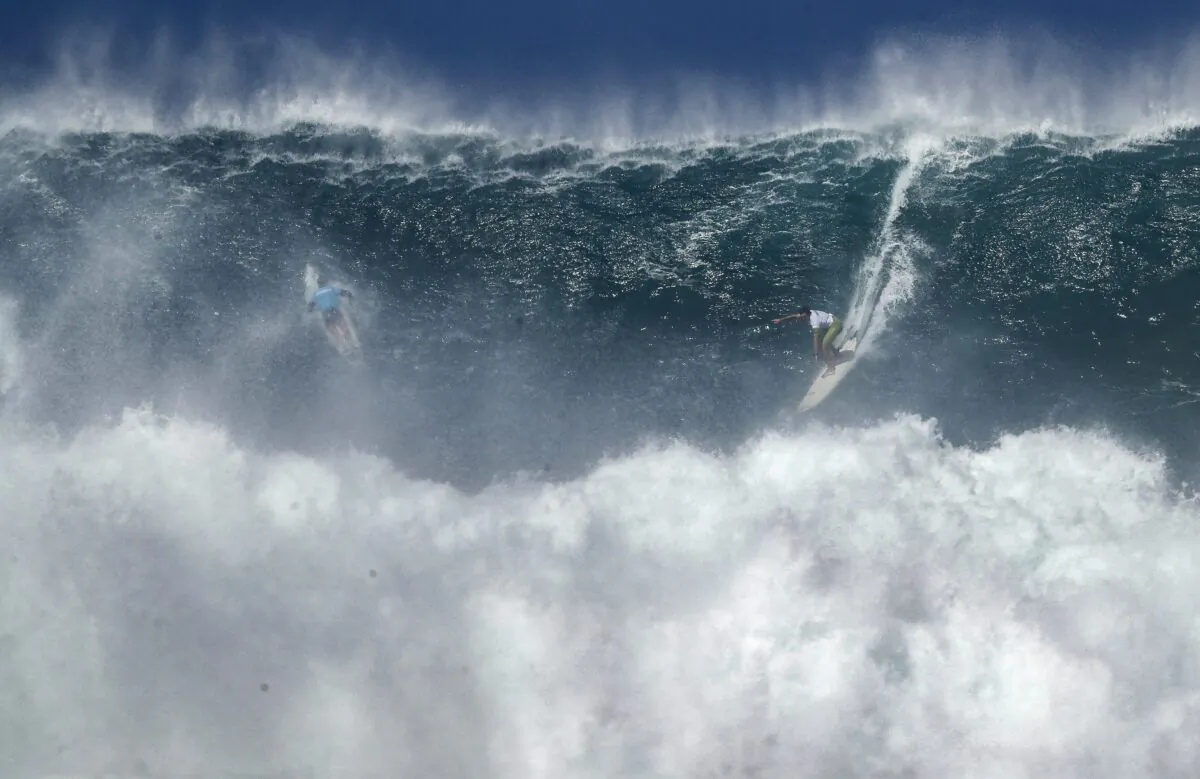 Luke Shepardson rides a wave during The Eddie Aikau Big Wave Invitational at Waimea Bay on Sunday, Jan. 22, 2023, on Oahu's North Shore, in Hawaii. (Jamm Aquino/Honolulu Star-Advertiser via AP)