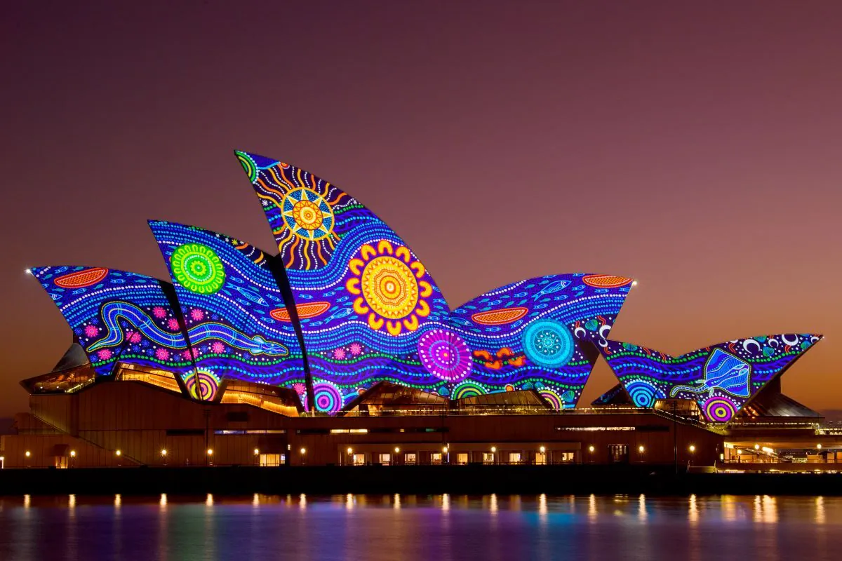 Kamilaroi artist Rhonda Sampson’s ‘Diyan Warrane’ artwork is projected onto the sails of the Sydney Opera House at dawn during Australia Day 2023 celebrations in Sydney, Australia, on Jan. 26, 2023. (AAP Image/Bianca De Marchi)