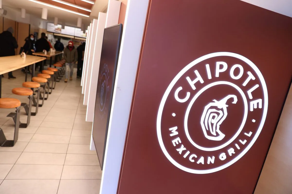 A signage is seen in a Chipotle outlet in Manhattan, N.Y., on Feb. 7, 2022. (Andrew Kelly/Reuters)