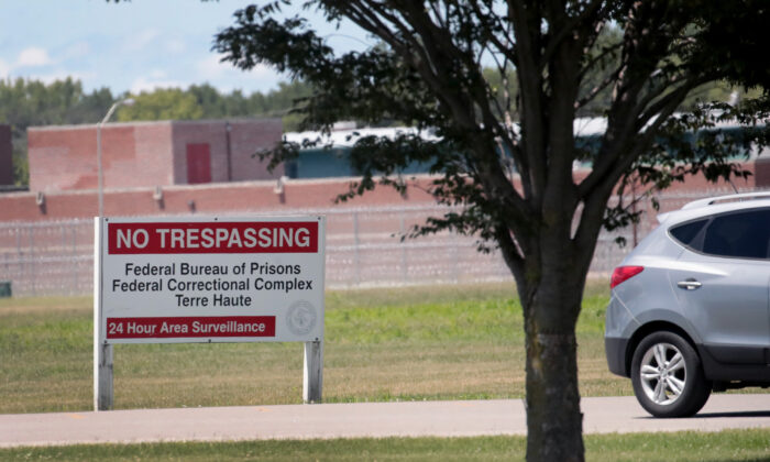 A sign sits at the entrance of the Federal Correctional Complex in Terre Haute, Ind., on July 13, 2020. (Scott Olson/Getty Images)