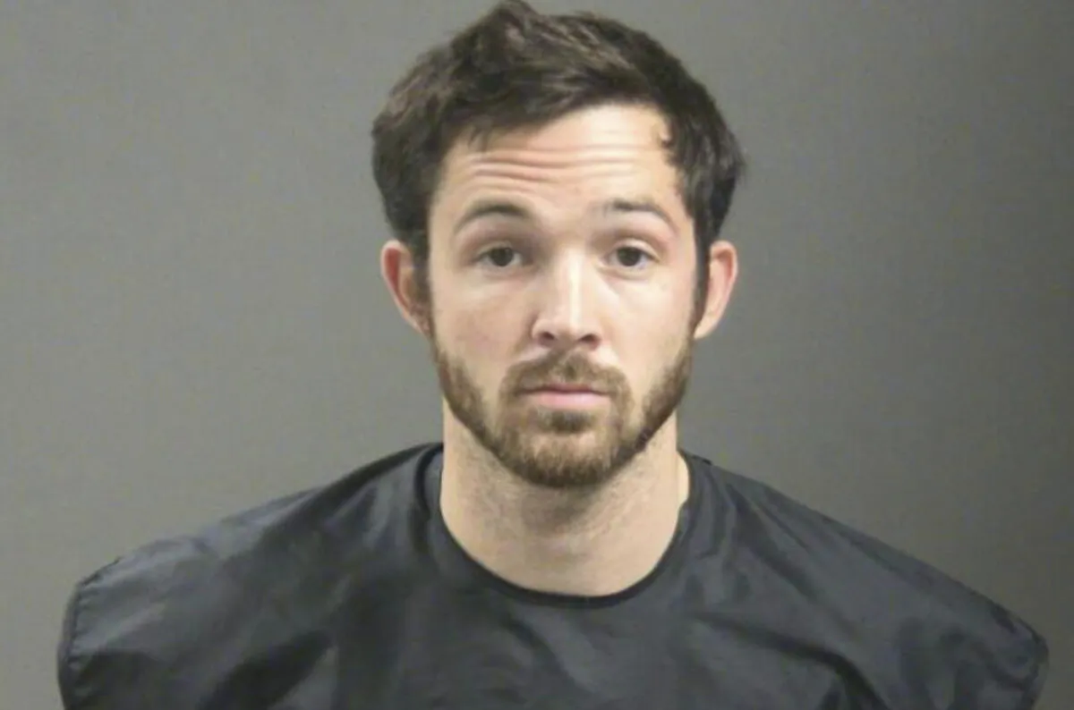 John Tyson, Tyson Foods chief financial officer, in a booking photo. (Washington County Sheriff's Office via AP)