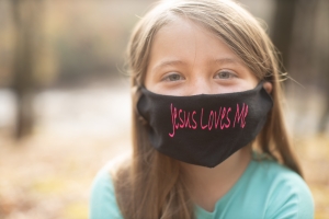 Third grader Lydia Booth wearing the mask that prompted a First Amendment lawsuit after school administrators tried to ban her religious expression in Pinola, Miss. (Courtesy of Alliance Defending Freedom)