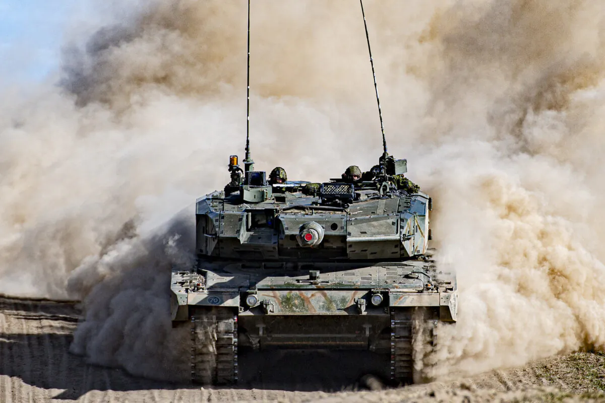 A Leopard 2A4 tank from Lord Strathcona’s Horse (Royal Canadians) travels on the Black Route of the 3rd Canadian Division Support Base Garrison Wainwright Training Centre in preparation for Exercise Maple Resolve 21, on April 30, 2021. (Canadian Armed Forces photo via Flickr/Sailor First Class Camden Scott)
