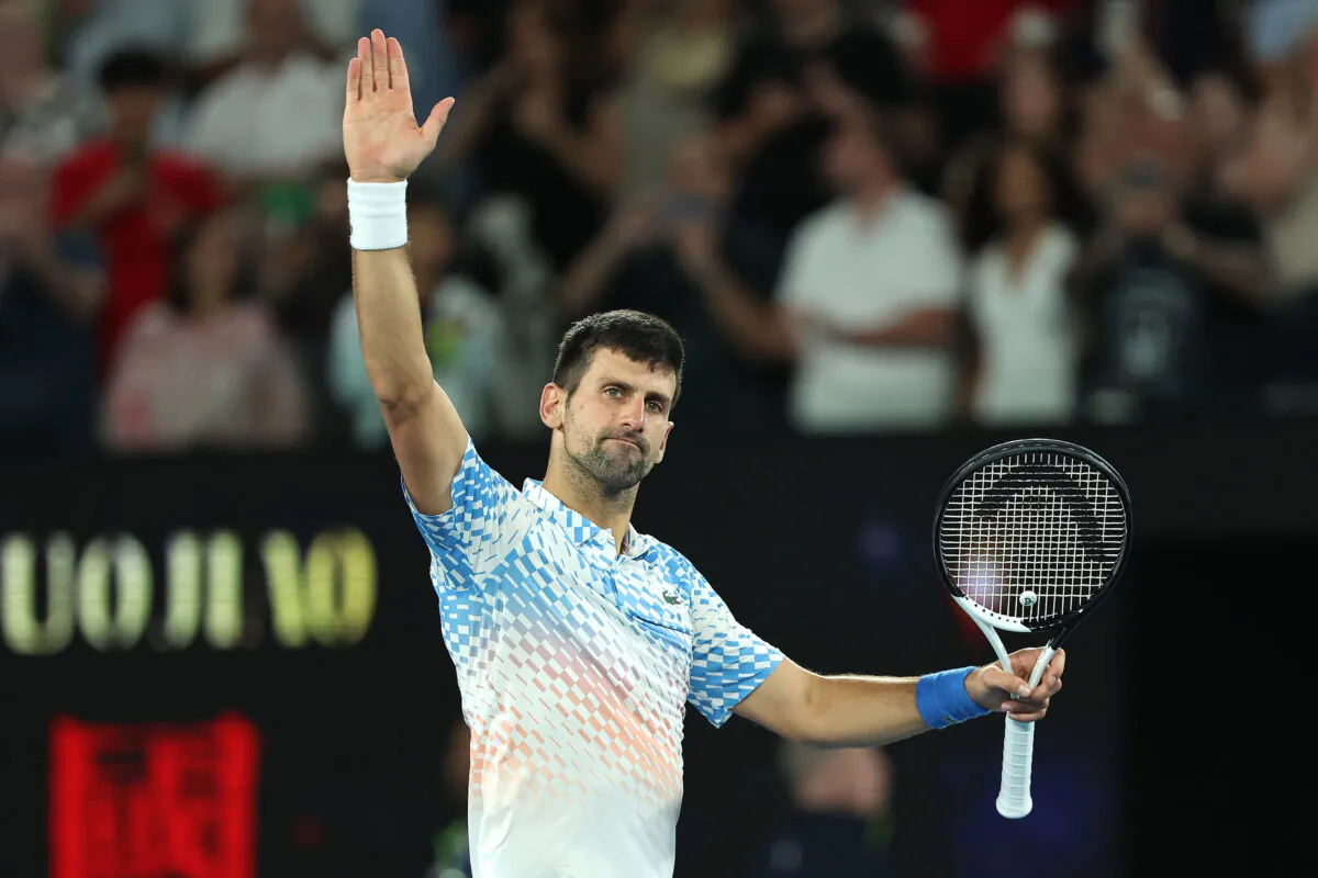 Novak Djokovic of Serbia celebrates after winning in the Quarterfinal singles match against Andrey Rublev during day ten of the 2023 Australian Open at Melbourne Park in Melbourne, Australia, on Jan. 25, 2023. (Cameron Spencer/Getty Images)