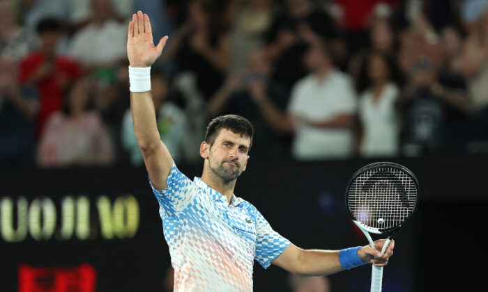 Novak Djokovic of Serbia celebrates after winning in the Quarterfinal singles match against Andrey Rublev during day ten of the 2023 Australian Open at Melbourne Park in Melbourne, Australia, on Jan. 25, 2023. (Cameron Spencer/Getty Images)
