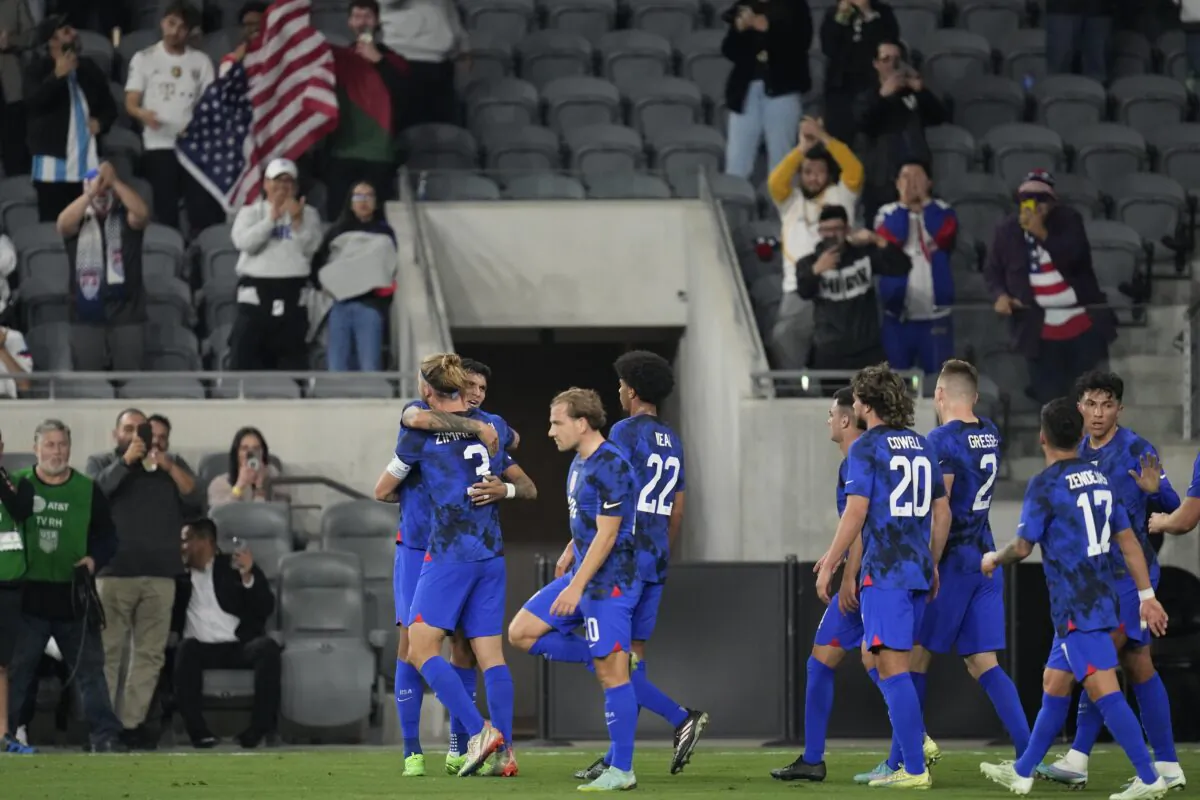 United States forward Brandon Vazquez (L) celebrates with defender Walker Zimmerman (3) after scoring during the first half of an international friendly soccer match against Serbia in Los Angeles on Jan. 25, 2023. (Ashley Landis/AP Photo)
