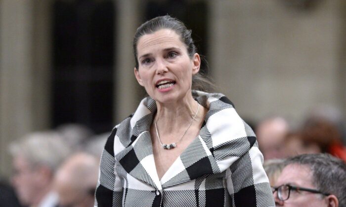 Minister of Science, Sport and Persons with Disabilities Kirsty Duncan rises during Question Period in the House of Commons on Parliament Hill in Ottawa on Mar. 1, 2018. (The Canadian Press/Justin Tang)
