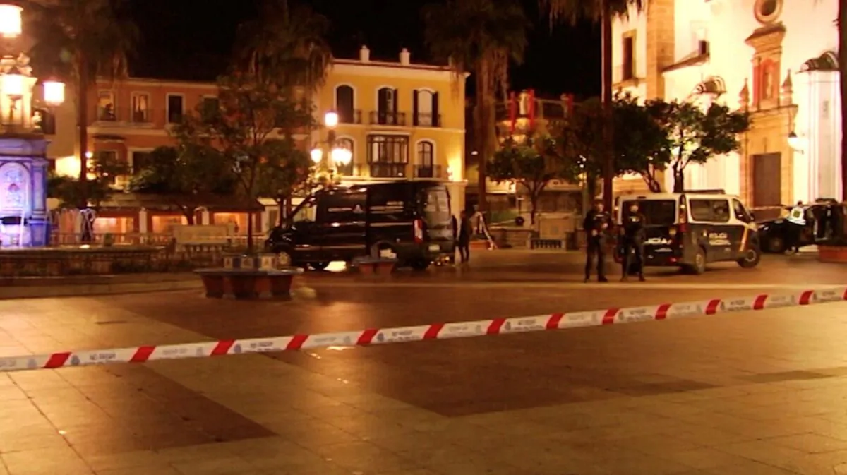 Police officers stand guard at the scene of a stabbing incident at a church in Algeciras, Spain, on Jan. 25, 2023, in this screen grab from a video. (FORTA/via Reuters/Handout via Reuters)