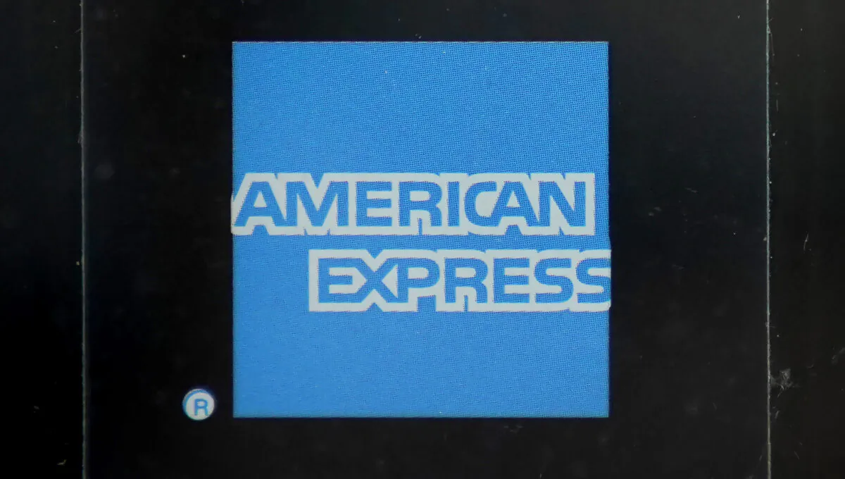 An American Express logo is attached to a door in Boston's Seaport District on July 21, 2021. (Steven Senne/AP Photo)