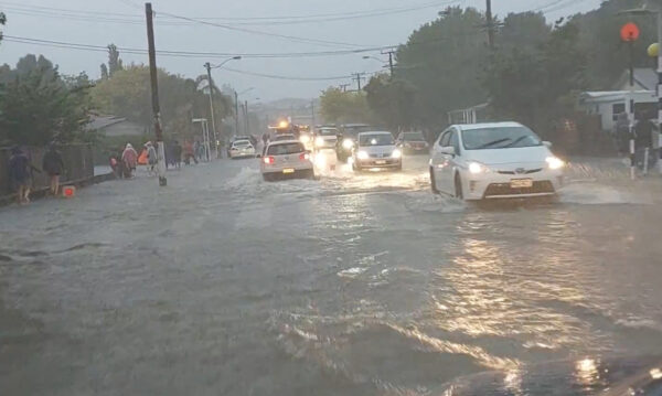 A general view of a flooded street after Elton John’s concert was canceled due to bad weather, in Auckland