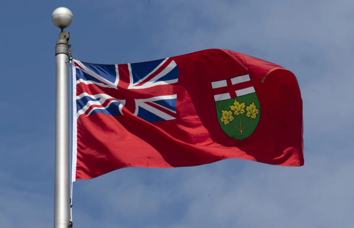 Ontario's provincial flag flies in Ottawa on July 6, 2020. (Adrian Wyld/The Canadian Press)