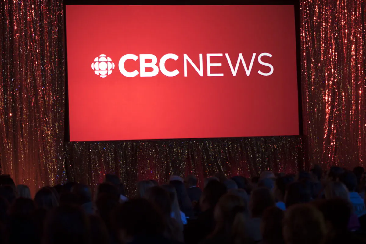 The CBC News logo is projected onto a screen during the CBC's annual upfront presentation at The Mattamy Athletic Centre in Toronto on May 29, 2019. (Tijana Martin/The Canadian Press)